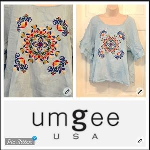 Umgee light blue embroidered ruffle sleeve top.
